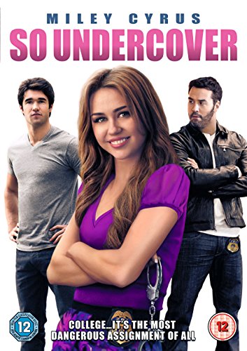 "DVD cover featuring Miley Cyrus in purple with two men standing behind her."