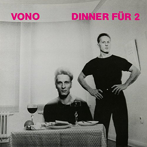 Black and white album cover with two men at a dinner table.