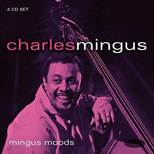 Charles Mingus smiling, holding a double bass, with pink and purple tint.