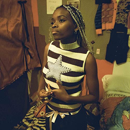 Hannah Jadagu album cover featuring a young Black woman with braids.