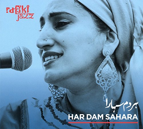 "Album cover with a smiling woman wearing a headscarf and large earrings, singing into a microphone."