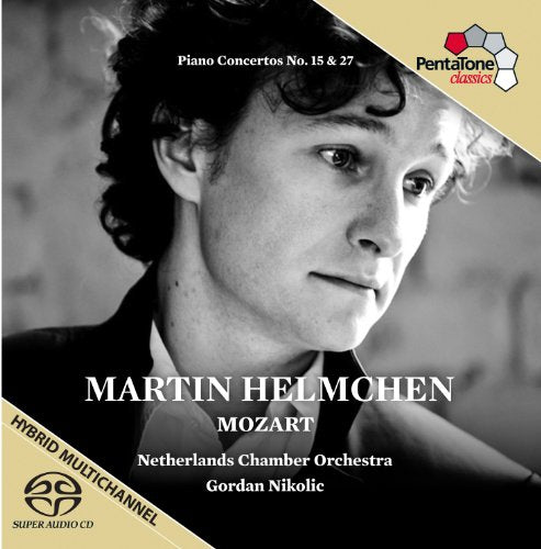 Black and white CD cover featuring a man with curly hair.
