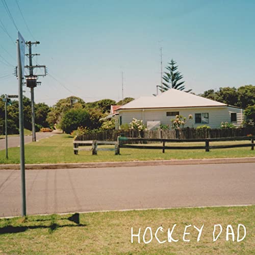Album cover: suburban street scene with a white house and text "Hockey Dad".