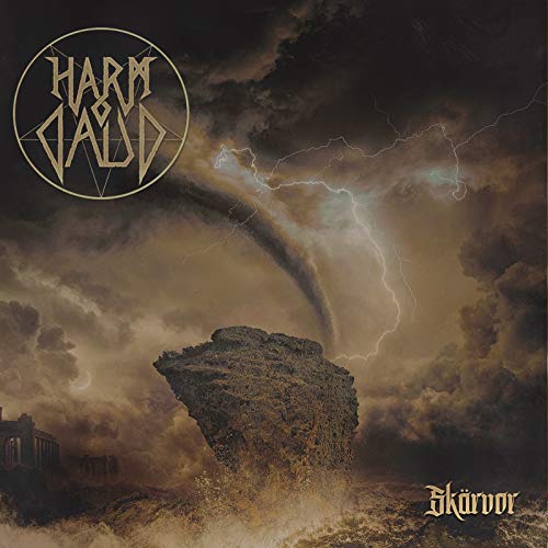 "Album cover with a dark, stormy landscape and a large rock formation."