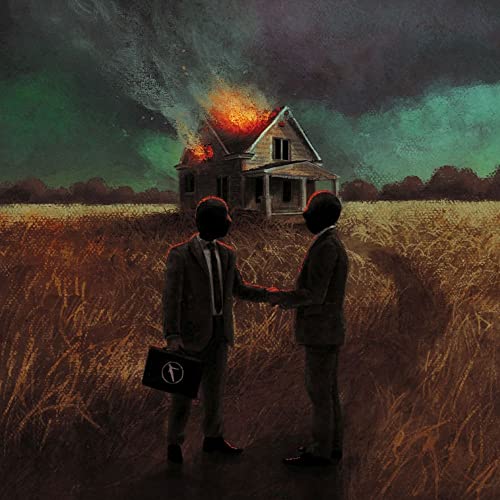 Two suited figures shake hands before a burning house in a field.