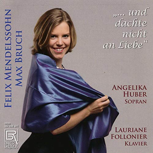 CD cover featuring a smiling woman wrapped in blue fabric, beige background.