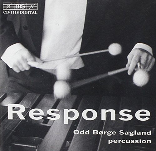 Black and white CD cover with a man playing a xylophone with mallets.