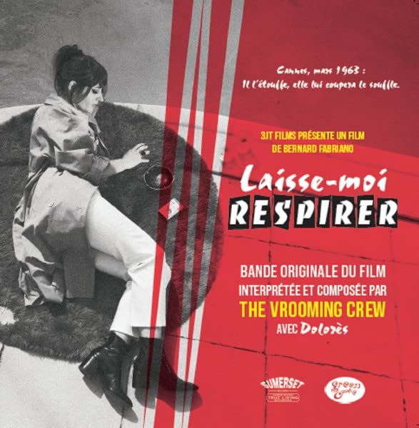 Vinyl record cover featuring a woman in red and bold French text.