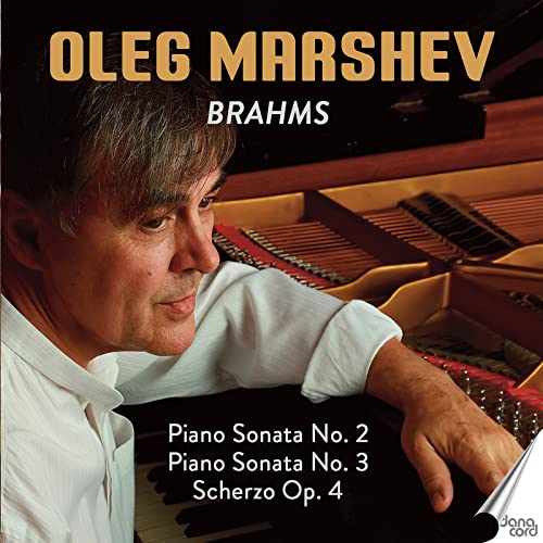 CD cover featuring pianist Oleg Marshev and a grand piano.