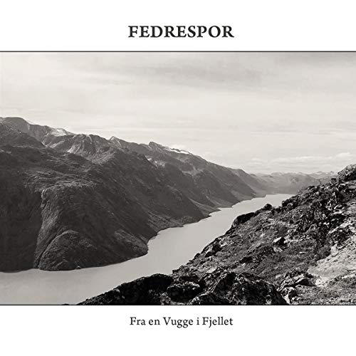 Black and white landscape image on a CD cover with mountain and lake scene.