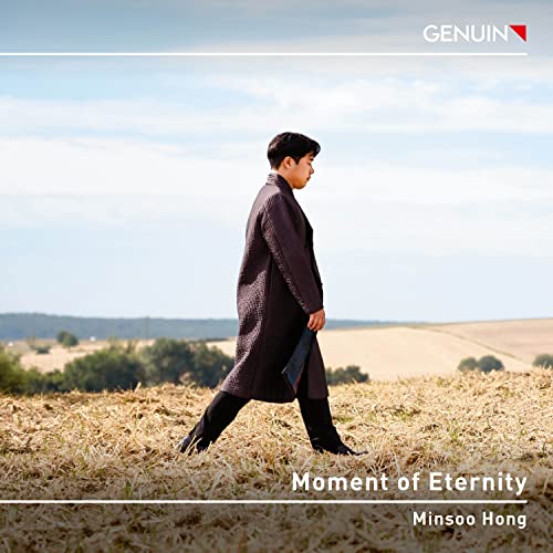 CD cover featuring Minsoo Hong walking in a field, titled “Moment of Eternity”.