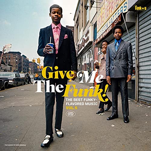 Album cover: three men in suits on a city street, text “Give Me The Funk!”
