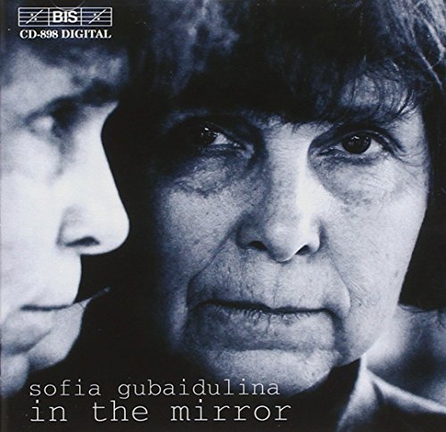 Black and white CD cover with a woman's face and reflection.