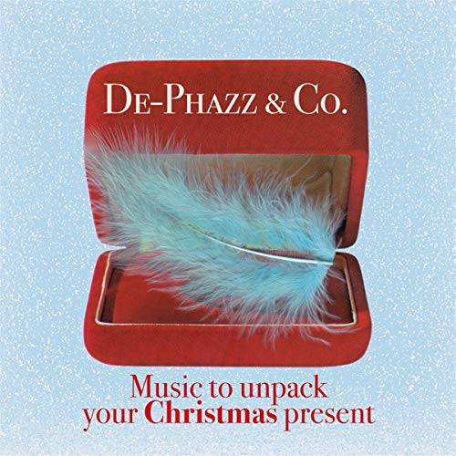 CD cover: open red gift box with a light blue feather inside.