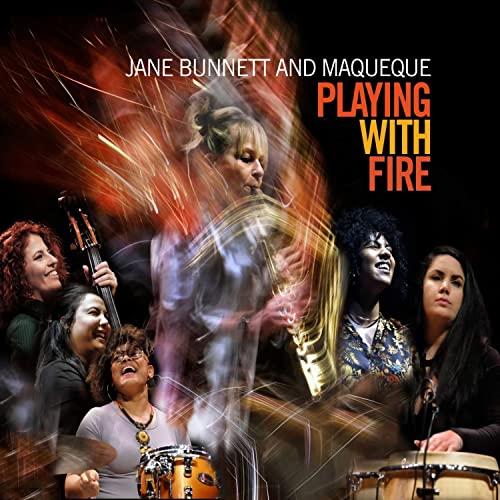 AlbumST CD cover featuringL featuring musicians with abstract fiery light effects and album textCL text.