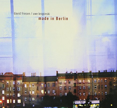 "Album cover with cityscape at night and 'made in Berlin' text."