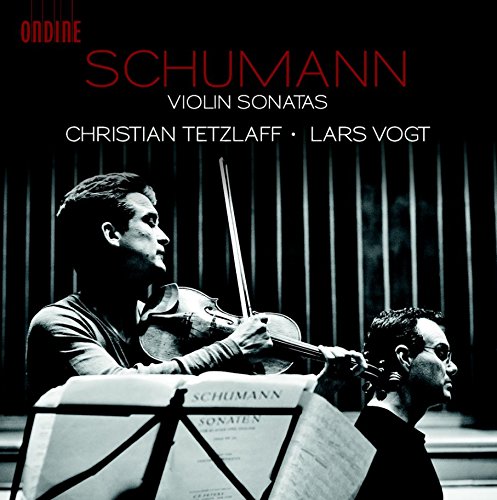 Black and white album cover of two men playing violin and piano.