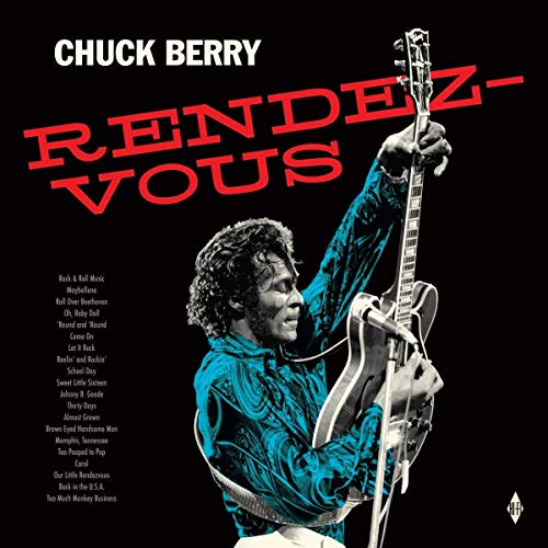 Chuck Berry album cover featuring a man playing guitar against a black background.
