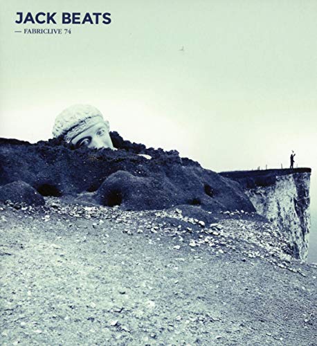 CD cover: a large stone head overlooks a coastal cliff edge.