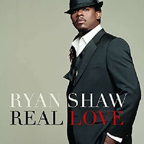 Ryan Shaw album cover featuring a man in a black suit and hat.