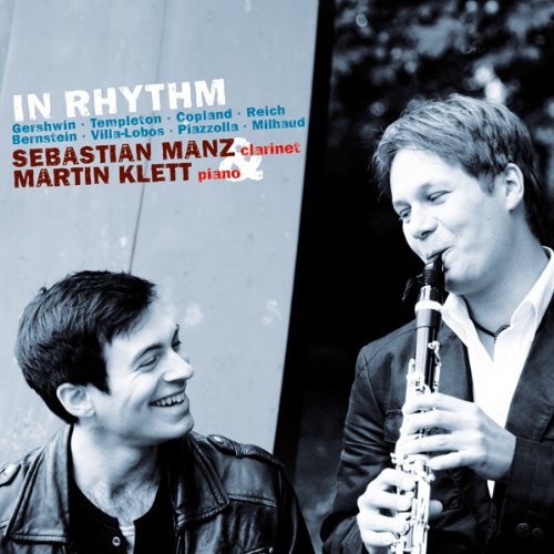 "Album cover with two men, one playing clarinet, in black and white with text overlay."