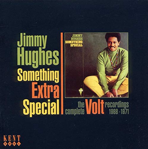 "CD cover with a man in a green turtleneck on a dark background."