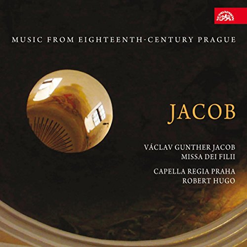"CD cover featuring a gold object on a dark background with text."