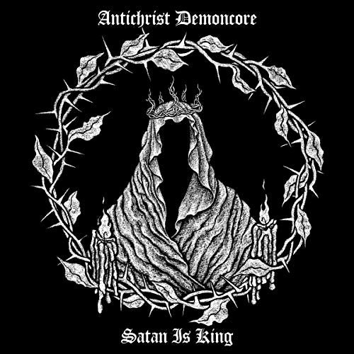 Black and white album cover with thorny crown and draped figure.