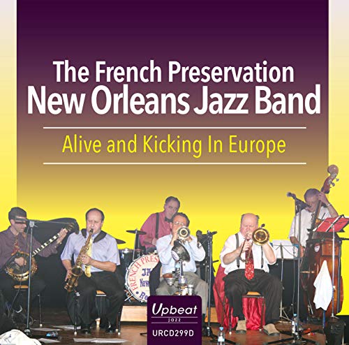"Album cover featuring a jazz band performing on stage with various instruments."