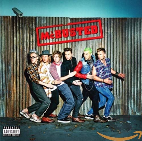McBusted album cover featuring five casually dressed men against a wooden fence.