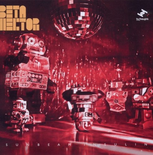 Album cover featuring robots on a stage lit by a red disco ball.
