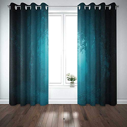 Dark teal and black ombre curtains hang over a window and wooden floor.