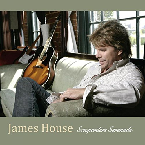 "Album cover featuring a man sitting on a couch with an acoustic guitar nearby."