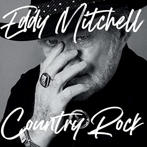 Black and white portrait of Eddy Mitchell, album cover for "Country Rock".