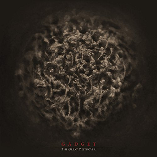 Dark album cover with a textured, spherical object and red and white text.