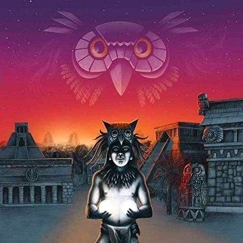 "Album cover art featuring a person in a feathered headdress holding a glowing orb."