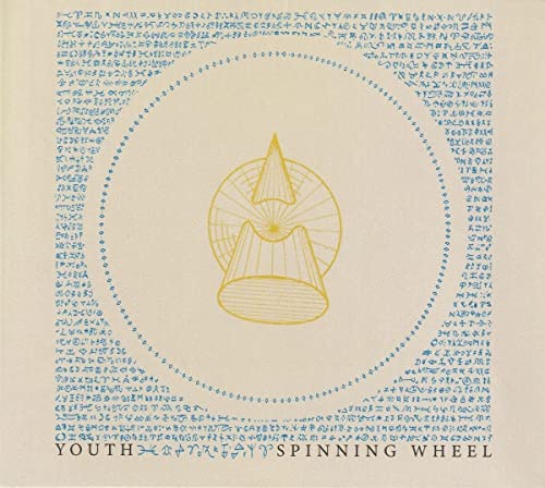 Vinyl record cover: concentric blue symbols around a yellow geometric design.
