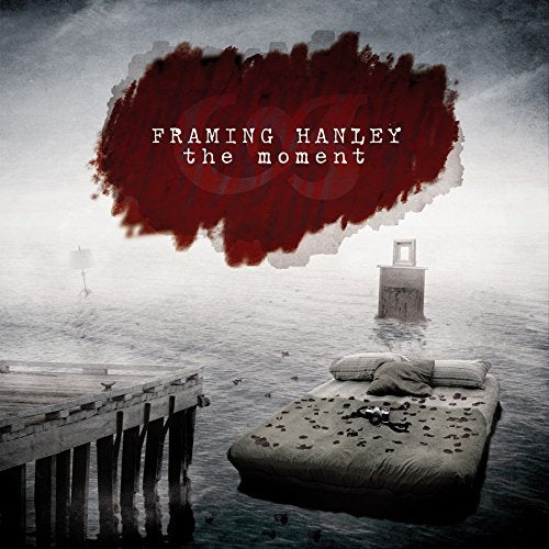 "Album cover with a mattress on water, pier, and red cloud."