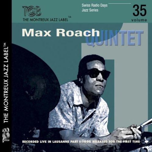 Blue-toned album cover with a man playing drums, wearing sunglasses.