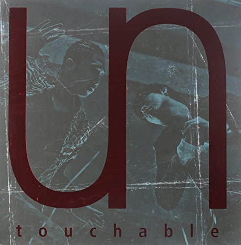 CD cover with a large red "U" and blurred figures.