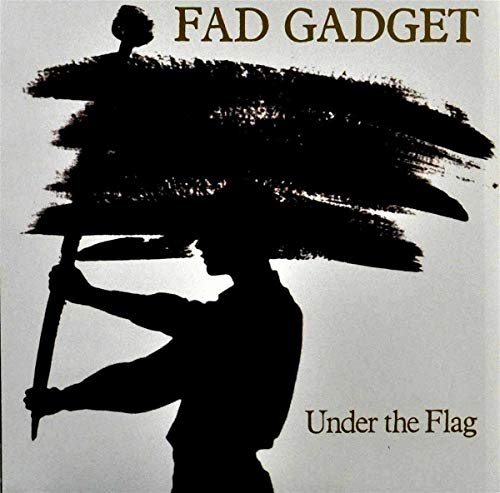 Silhouette of a person holding a flag, album cover for Fad Gadget.