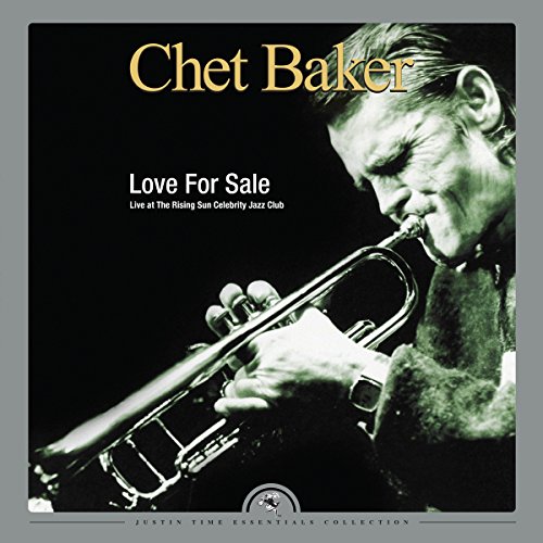 Chet Baker vinyl album cover featuring a man playing trumpet, black and white image.