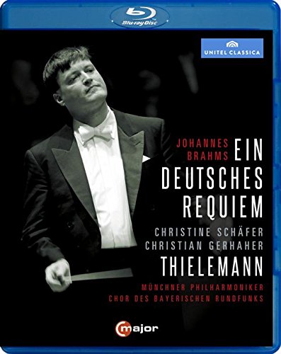 "Blu-ray case with black cover featuring a conductor in a tuxedo."