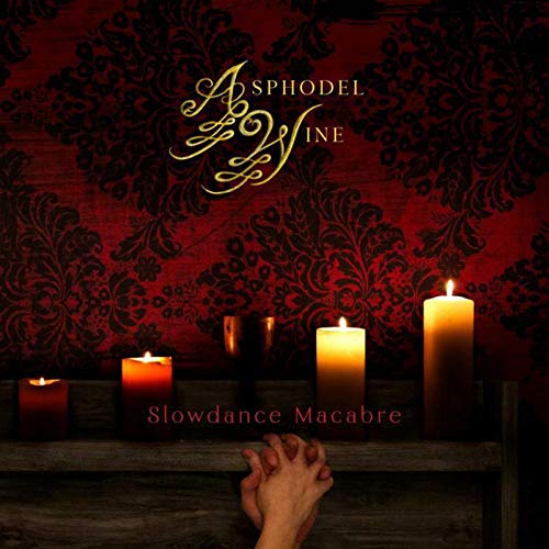 Red album cover with ornate script, candles, and praying hands.
