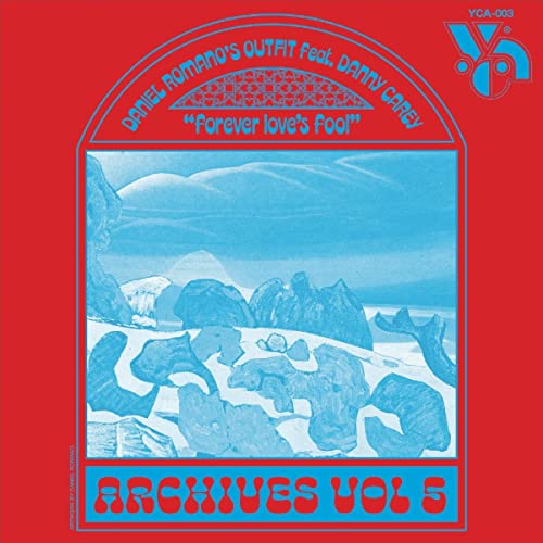 Vinyl record cover: blue mountain landscape with red background and text.