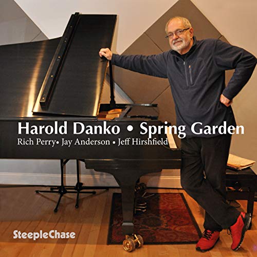 CD cover featuring pianist Harold Danko leaning on a grand piano.