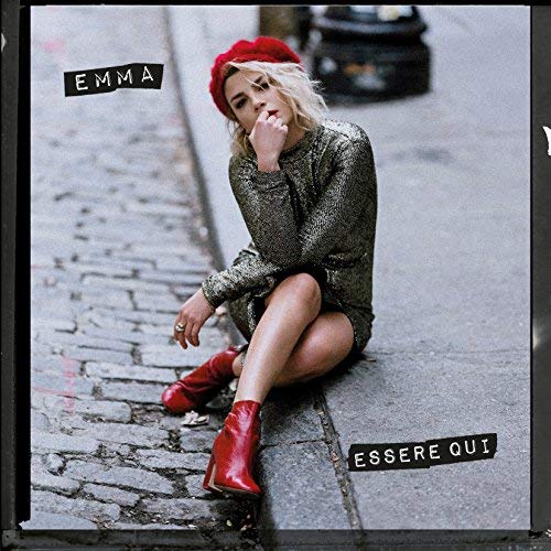 Emma album cover: woman in red beret and boots sits on pavement.