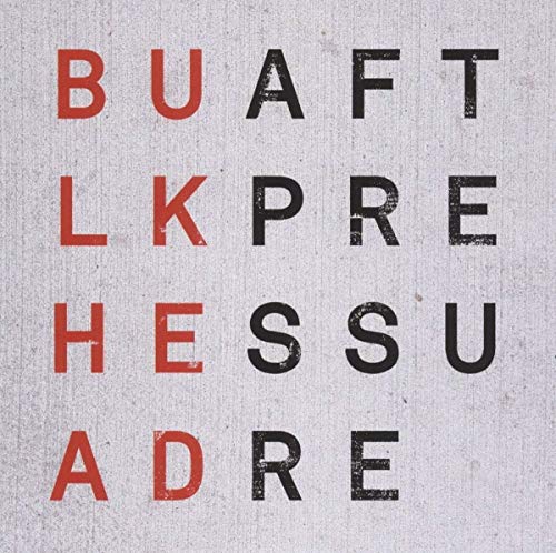 Album cover with red and black fragmented text on a textured background.
