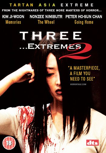 DVD cover for horror film "Three Extremes" featuring a distressed woman.