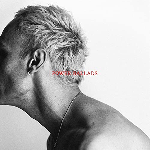 CD cover: Back of a man’s head with red text “Power Ballads”.
